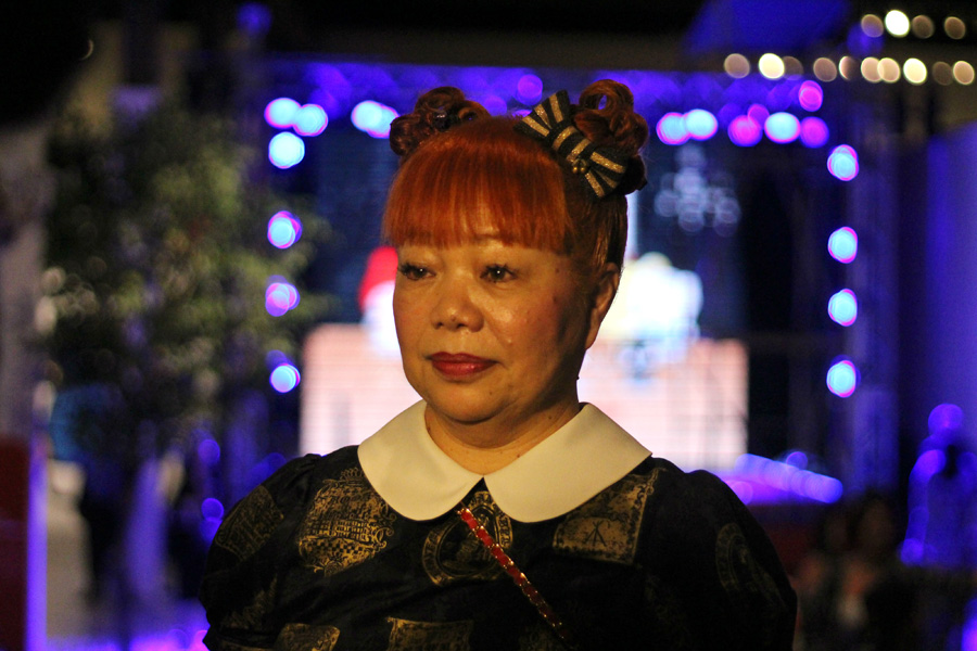 Older woman in Hello Kitty cosplay