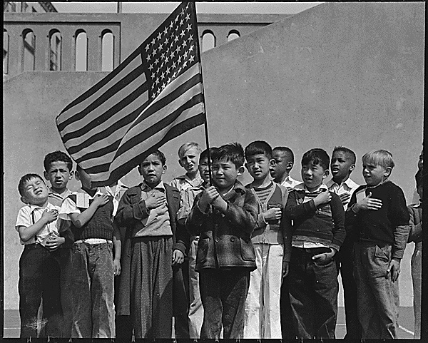 Children participate in the pledge of alliegance.